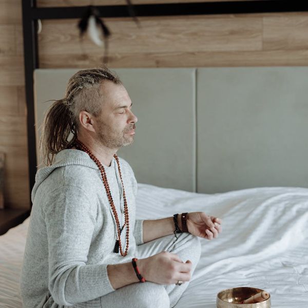 Man in a calm, meditative state after a workout, symbolizing inner peace.